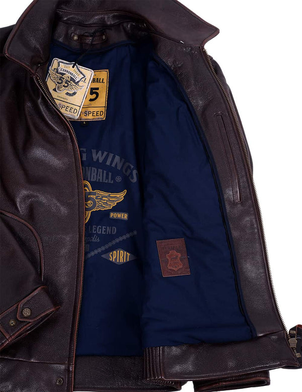 Men's brown leather jacket unbuttoned, revealing the dark blue lining and the inside pocket.