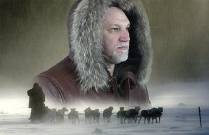 A man in a brown leather down jacket.