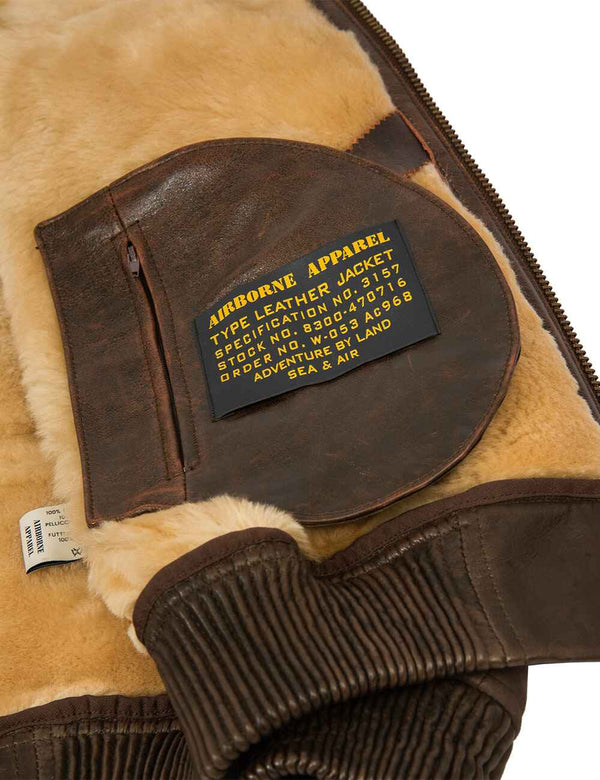 Men's brown sheepskin coat pocket.