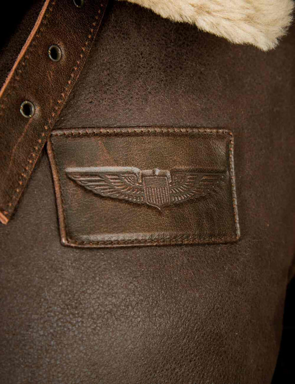 Patch on the chest of a brown sheepskin jacket.