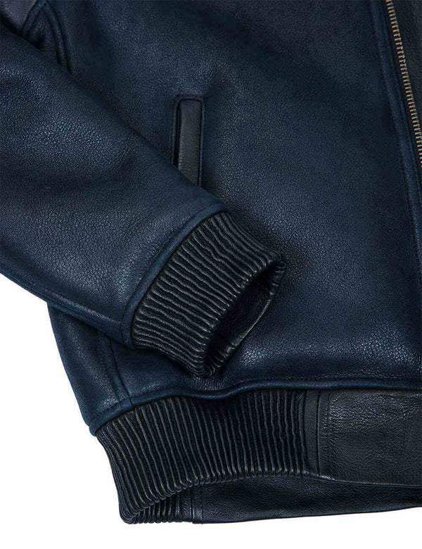 Part of a men's dark blue sheepskin jacket.