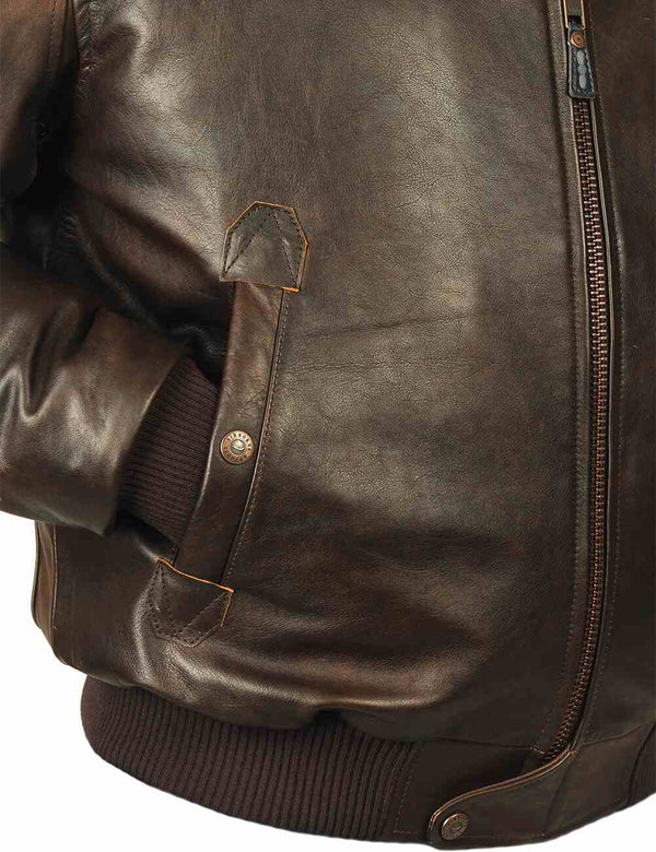 Vertical pocket on men's brown leather jacket with elastic band.