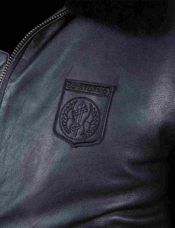 Patch on the chest of a men's black leather jacket.