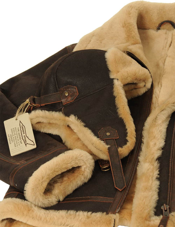 The right side of a men's brown sheepskin jacket, with a brown fur hat with earflaps.
