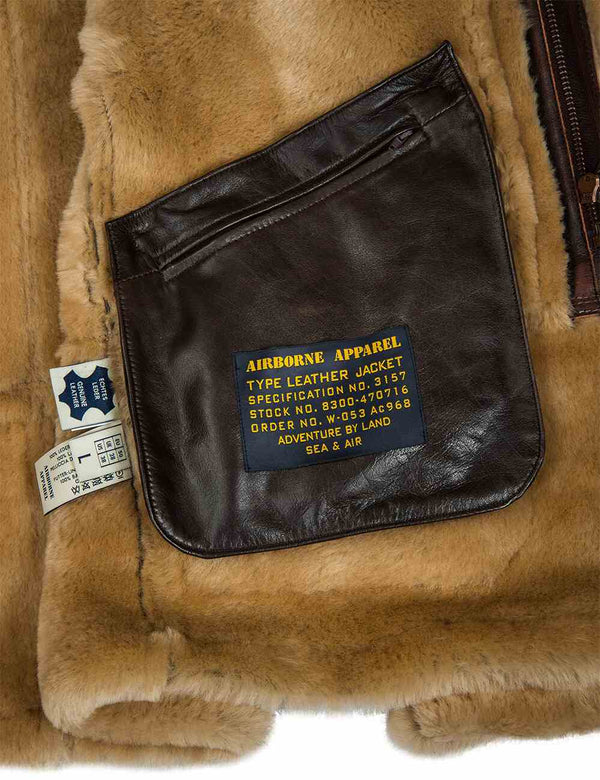 Men's brown sheepskin coat pocket.