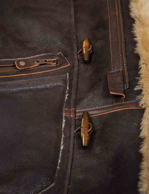 Buttons of men's brown sheepskin coat.