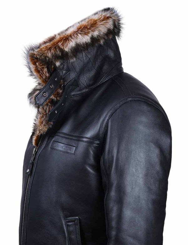 Side view of black leather jacket with fur and raised collar on white background.