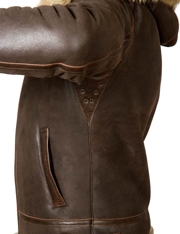 The side lower part of a men's brown sheepskin jacket.