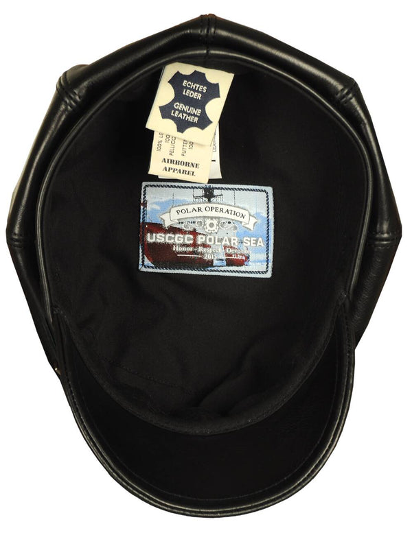 Men's black leather cap with patch, inside.