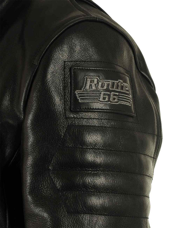 Patch on the left sleeve of a men's black leather jacket.