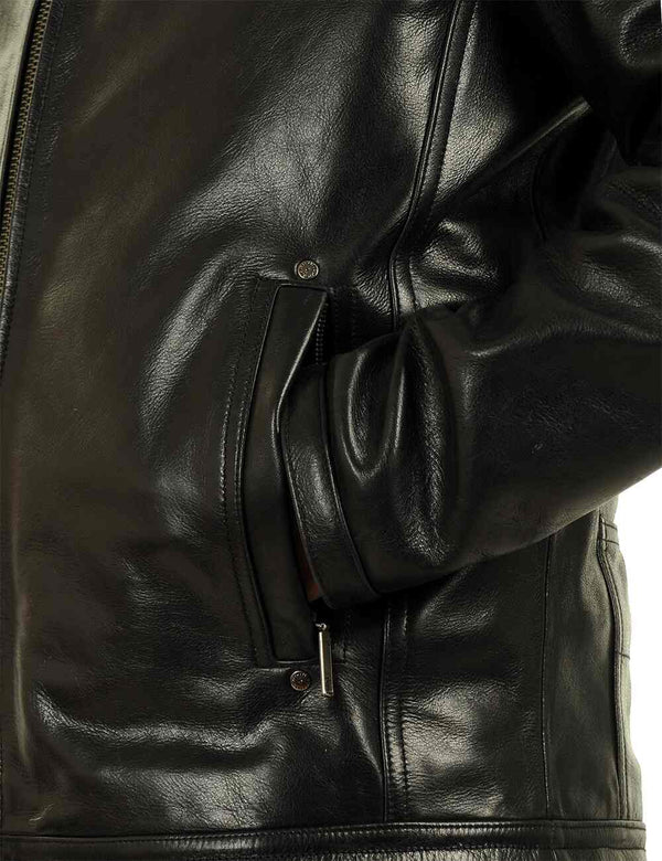 Left pocket of a men's black leather jacket, the sleeve is in the pocket.