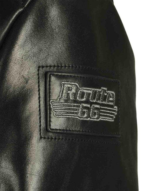 Patch on the sleeve of a black leather jacket.