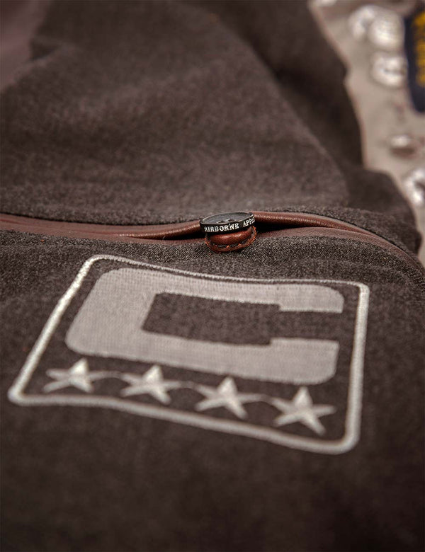 Inside pocket with logo of a brown leather jacket.
