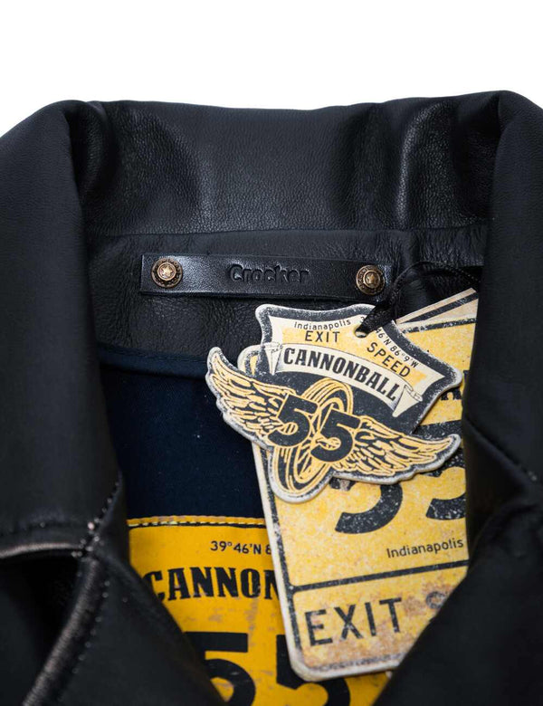Orange and black tag inside the leather jacket.