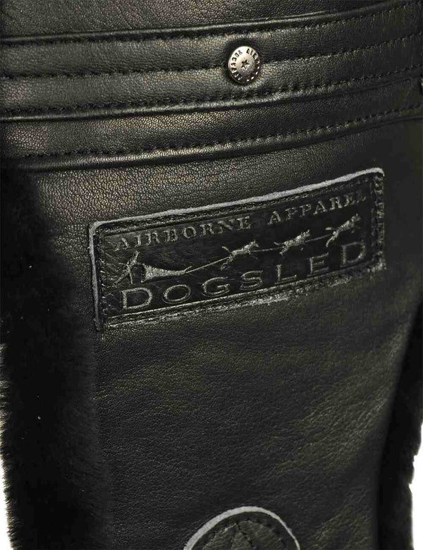 Leather patch on a black trapper hat.