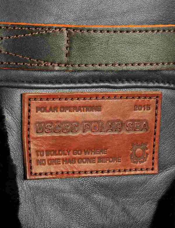 Light brown leather patch on a leather trapper hat