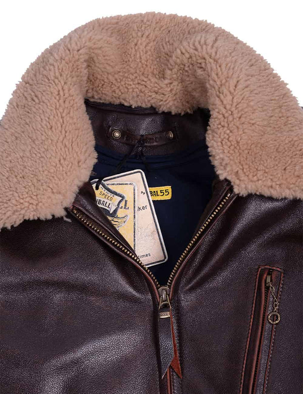 Fur collar of a men's brown leather jacket.