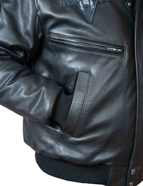 Pocket and part of the sleeve of a black men's leather jacket.