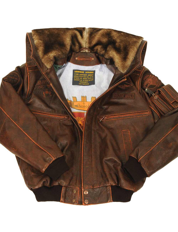 Brown men's leather jacket with an elastic waistband and a fur hood.