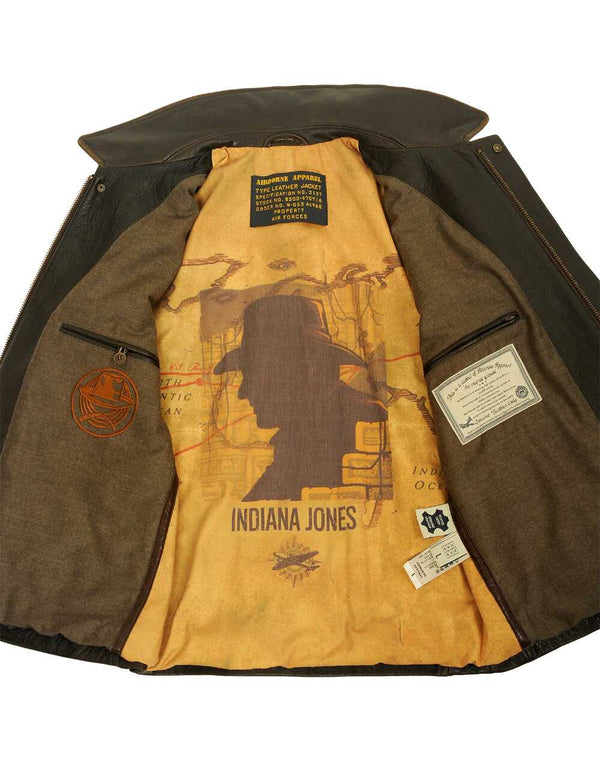 Men's brown leather jacket unbuttoned, revealing orange patterned lining and inside pockets.