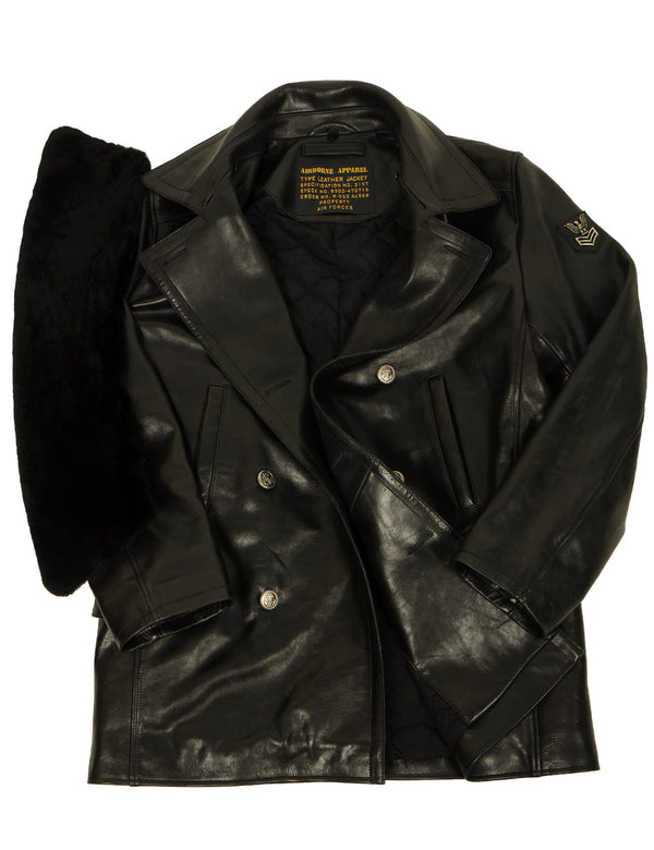 Men's black leather pea coat with detachable fur collar.