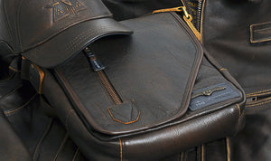 Brown leather cap, bag and jacket.