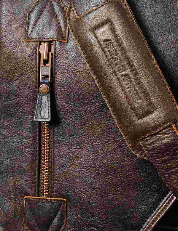 Side pocket on a brown men's leather bag.