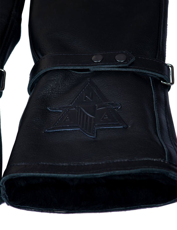 Patch on black men's leather gloves with fur.