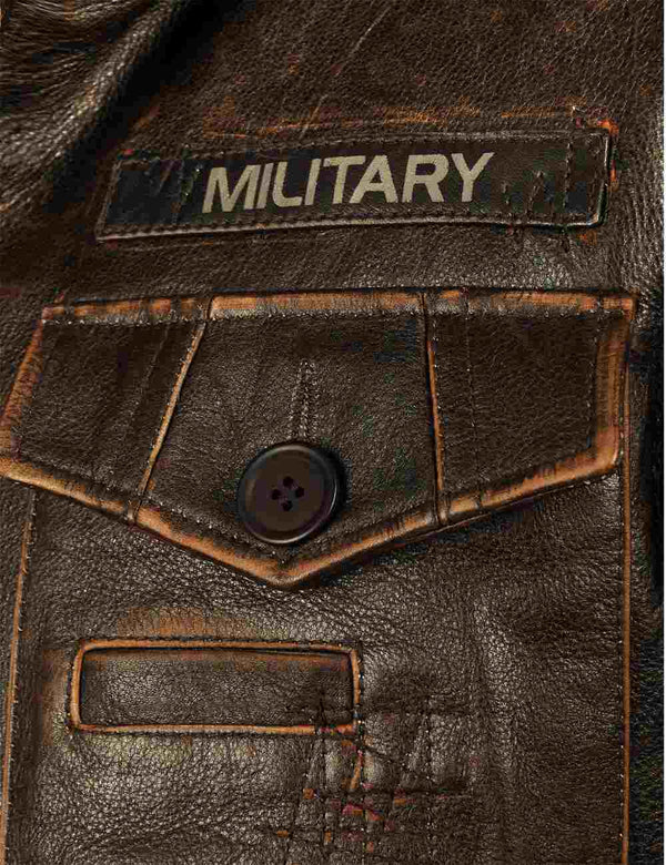 A pocket of a brown men's leather jacket.