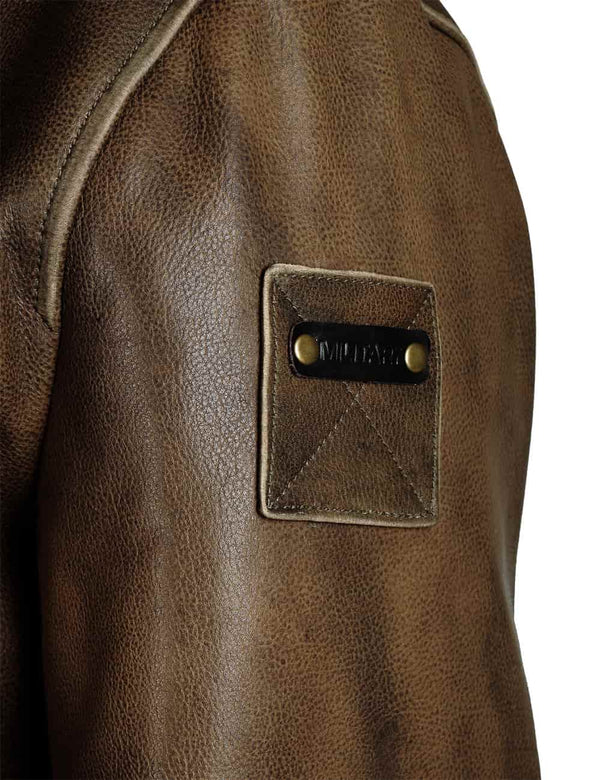 Patch on the left sleeve of a men's olive leather jacket.