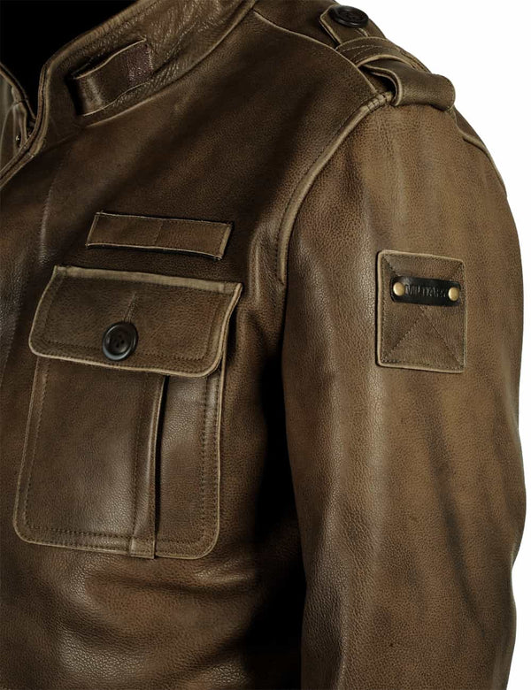 Patch on the sleeve of olive leather jacket.