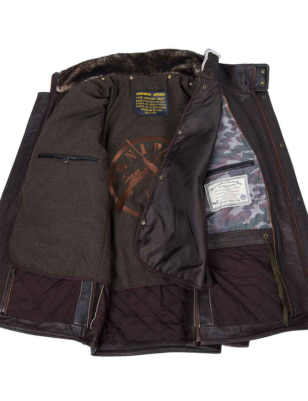 Men's long brown leather jacket unbuttoned, revealing a removable lining with a fur collar.