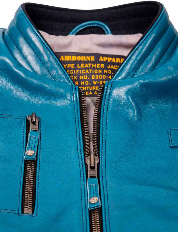 Metal zipper on a men's lagoon blue leather jacket.