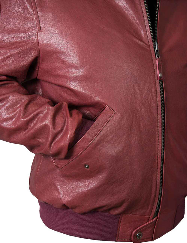 The right side of a men's leather bordo jacket, the sleeve is in the pocket.