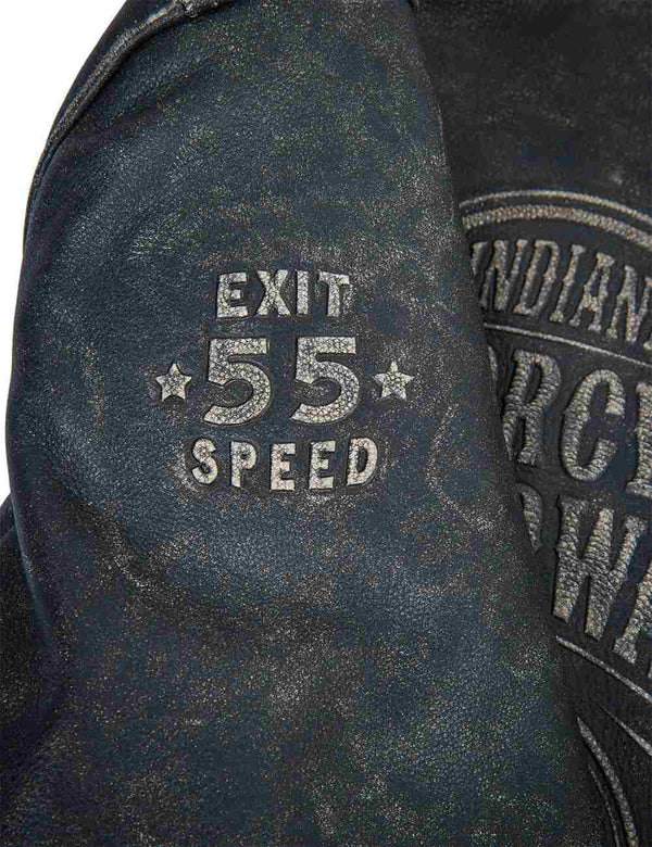 Embossing on the sleeve of a men's black jacket with light seams.