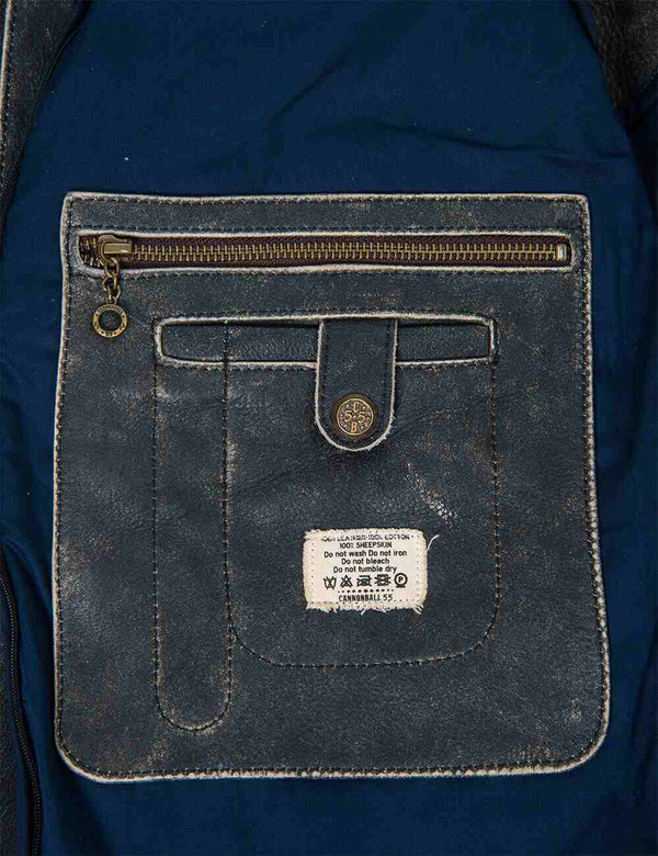 Inside pocket of a black men's leather jacket.