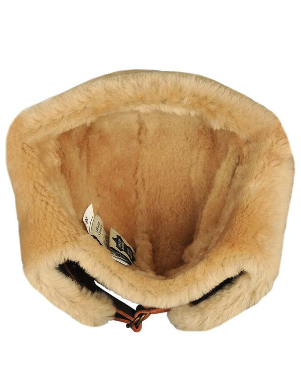 Men's brown fur hat with earflaps, inside view.