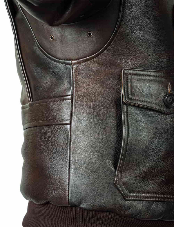 Side part of a men's brown leather jacket with an elastic band.