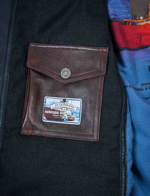 Inside pocket of men's blue leather parka.