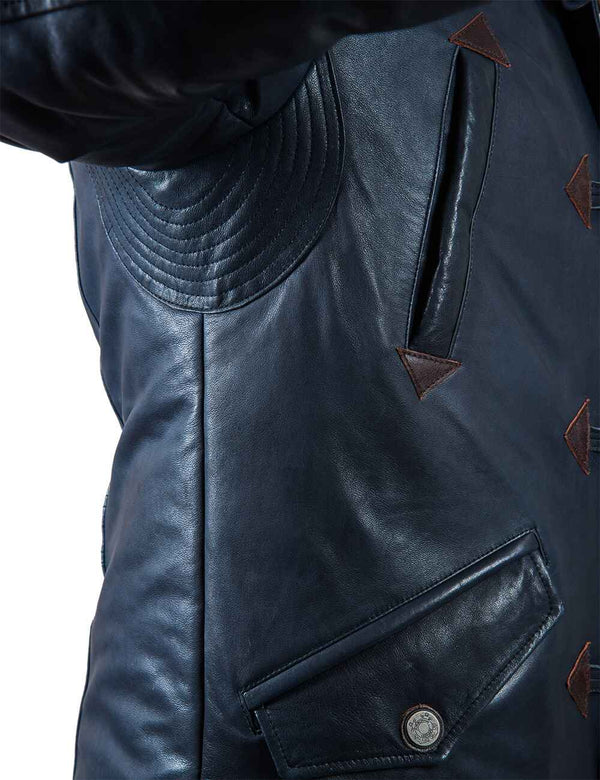 Underarm section of a men's blue leather parka.