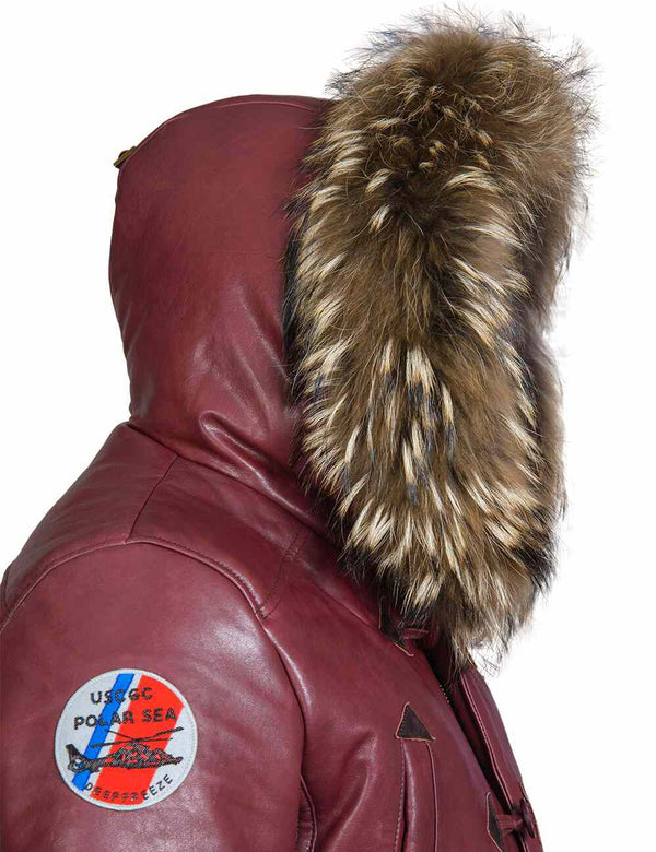 Side view of hood with raccoon fur trim on men's burgundy leather jacket.