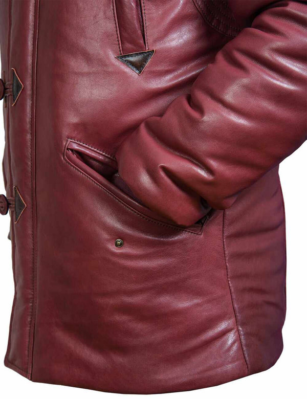 Lower left side view of men's burgundy leather jacket.