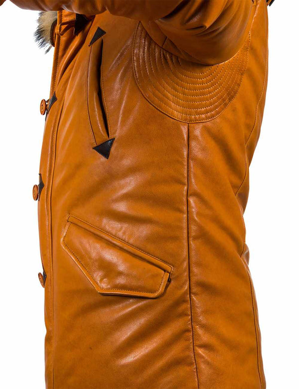 The side of a men's orange leather down jacket. The arm is raised, you can see the seam treatment under the sleeve.