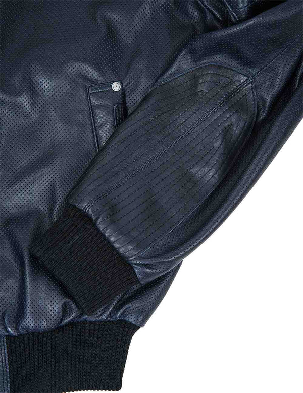 The left lower part and sleeve with knitted cuff of a dark blue men's leather jacket.