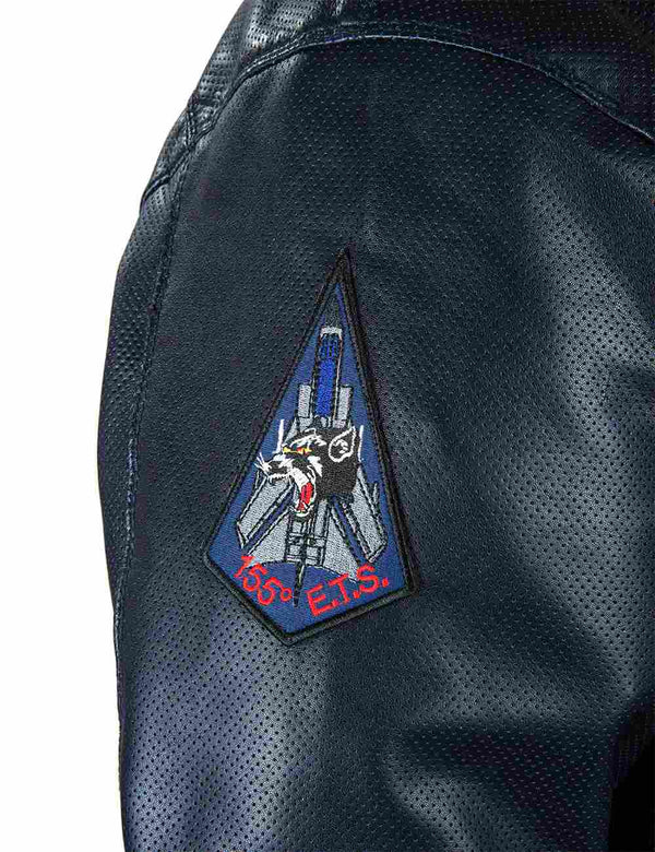 Patch on the right sleeve of a dark blue men's perforated leather jacket.