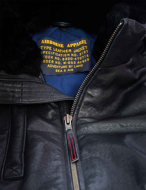 Metal zipper of men's leather down jacket.