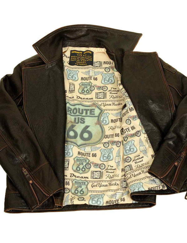 Men's brown leather biker jacket unbuttoned, revealing a bright printed lining.