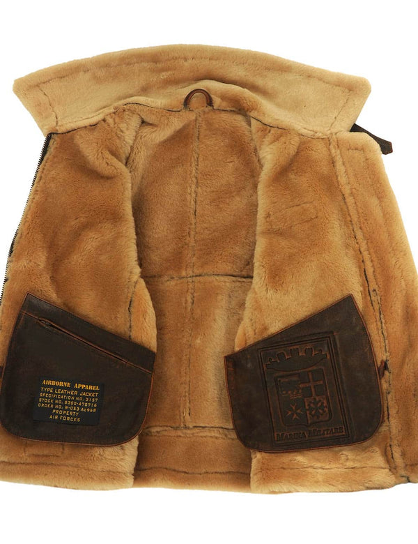 Men's brown sheepskin jacket unbuttoned, revealing beige fur.