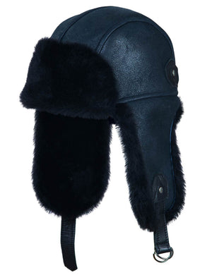 Navy blue leather aviator hat with black fur trim on a white background.