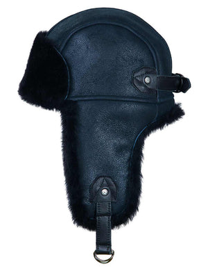 Navy blue leather aviator hat with black fur trim on a white background.